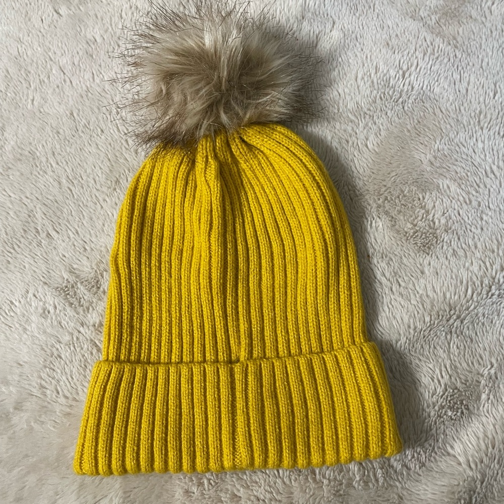 Yellow a new day beanie with Pom